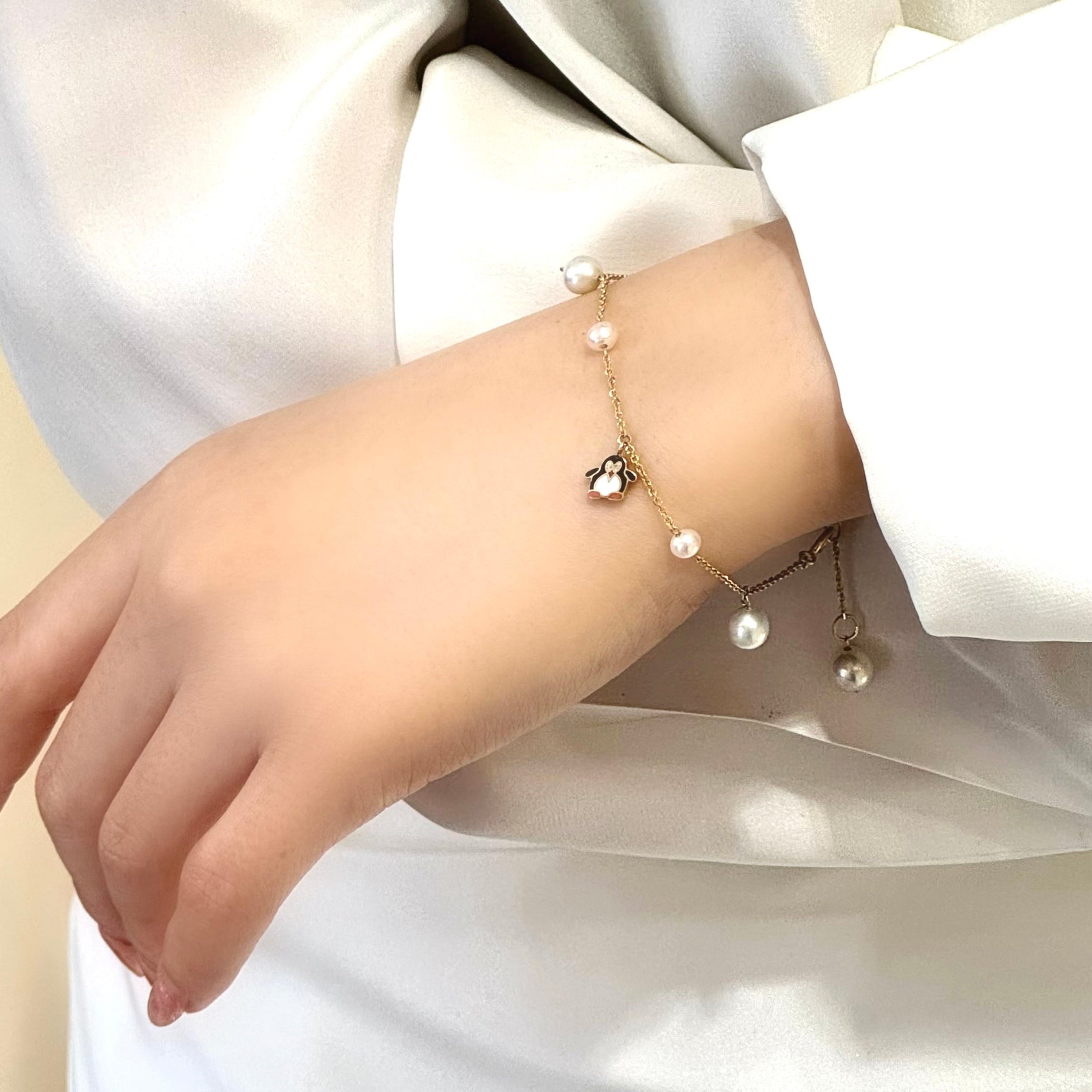 Pearly Penguin Charm Bracelet in 14k