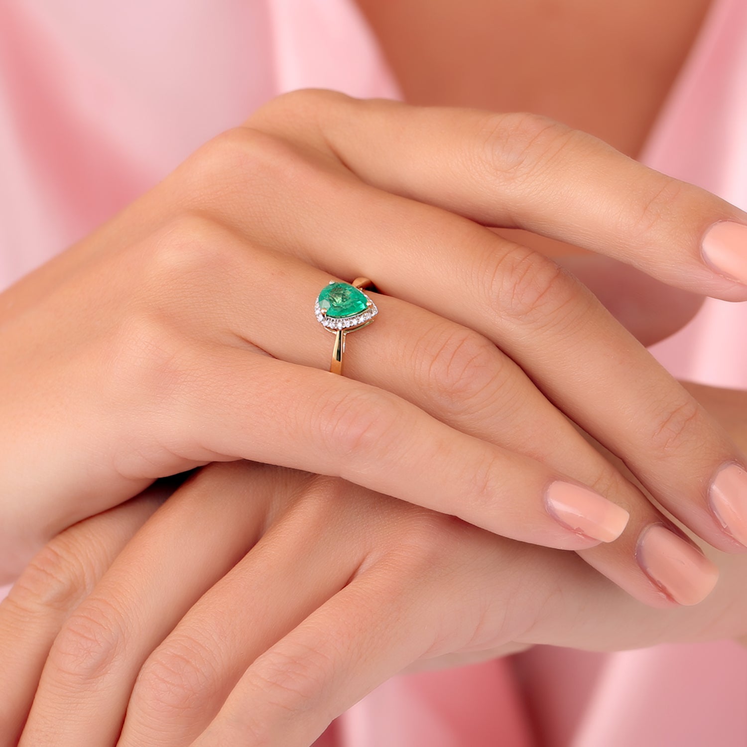 Pear shaped Emerald Diamond Ring
